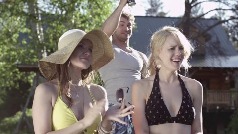 Kristen Hager, Crystal Lowe - Nudity in A Little Bit Zombie (2012)